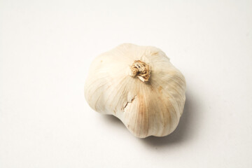 1 head of dried garlic on a white background