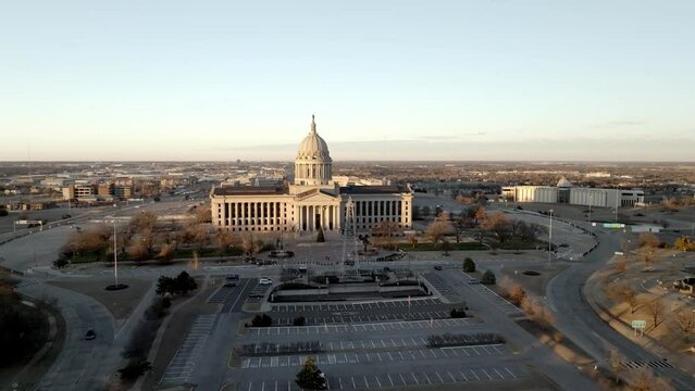 Oklahoma state capitol building in Oklahoma City, Oklahoma with drone video circling medium shot.