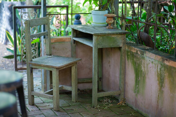 Fototapeta na wymiar Chair in garden amidst nature