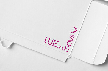 we are moving sign on white background	