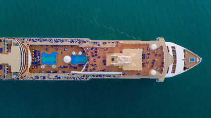 Aerial top view Cruise Ship, Cruise Liners beautiful white cruise ship above luxury cruise in the ocean concept exclusive tourism travel on holiday take a vacation time on summer	