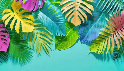 Zelfklevend Fotobehang Immerse yourself in a burst of colors with this tropical leaf border against a serene blue background. A minimalistic nature concept that offers copyspace for your creative text © Logo