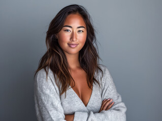 Fototapeta premium Portrait of a young positive woman looking at the camera