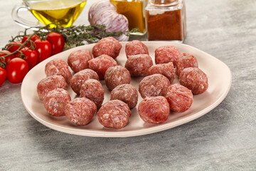 Uncooked raw beef meatball minced