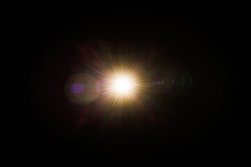 Easy to add lens flare effects for overlay designs or screen blending mode to make high-quality images. Abstract sun burst, digital flare, iridescent glare over black background.