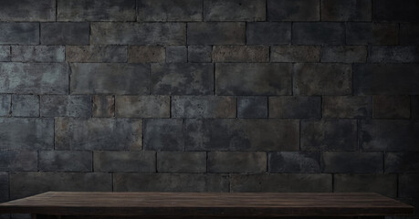 wood table in front of black dirt brick wall