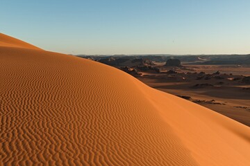 Fototapeta na wymiar View of the Dunes of Tin Merzouga in Tadrart Rouge, Tassili N'Ajjer National Park. Sahara, Algeria, Africa.