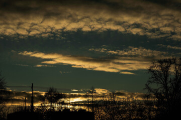 clouds in the sunset light, taken on a winter evening