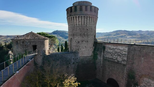 Aerial view from towers of Brisighella Castle, also known as Rocca Manfrediana, one can see the 19th-century Clock Tower gracing the skyline. Brisighella village nestled in Italy's Lamone Valley