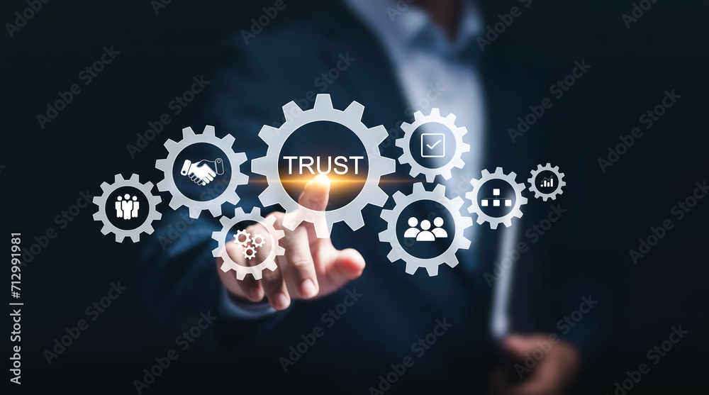 Wall mural credibility, reputation and trust concept, businessman touching virtual screen of trust word for bus