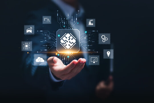 Microchip concept, businessman holding virtual screen of microchip icon for artificial intelligence automation and internet of things, IOT, Digital integration. Business internet and technology.