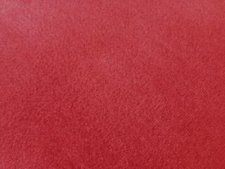 Red velvet fabric background in a luxurious style