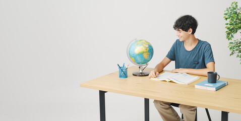 Young student doing his homework