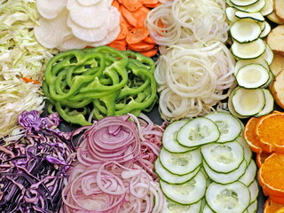 Cooking vegetable salad. Chopped vegetables, top view, background. Diet or vegan food concept. Salad ingredients. - 713019715