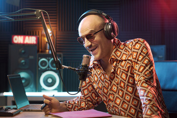 Host working at the radio broadcasting studio