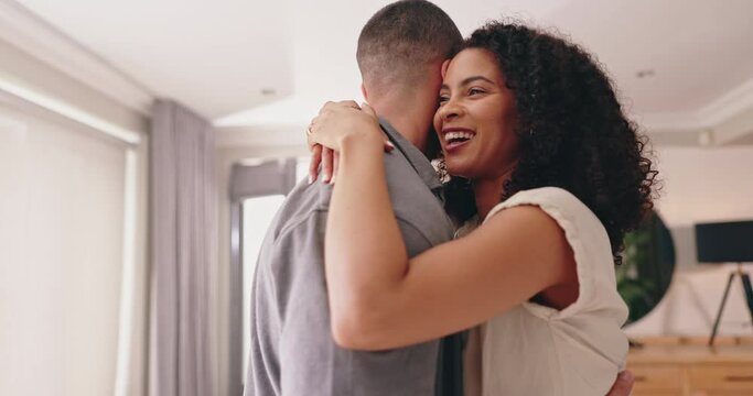 African couple, dance and happy in home with hug, conversation and care with bonding in apartment. Man, woman and dancer with embrace, love and comic chat with laugh, funny memory or smile in house