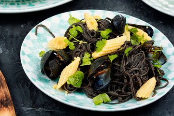 Black spaghetti pasta with mussels.