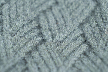 Pattern and texture of synthetic acrylic fabric close-up macro.