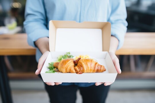 bear claw pastry in a to-go box, cafe branding