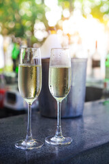 Glasses of champagne in outdoor resort bar