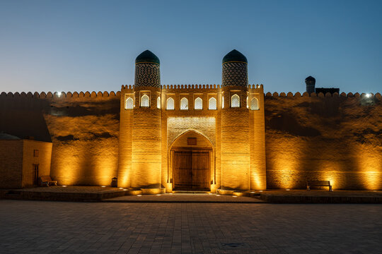 The ancient Zindan building and entrance gate to the fortress in the city of Khiva in Khorezm. Kohna Ark gates of the palace at night
