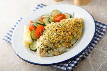White fish fillet with garlic crumbs and rosemary