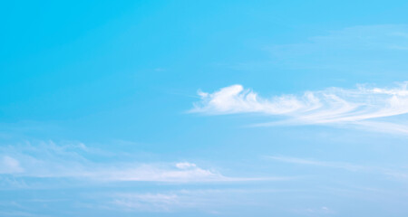 Pastel blue sky background with softly white fluffy cloud in the morning, Idyllic natural Horizon...