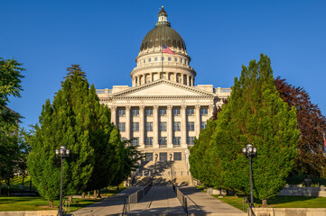 Utah State Capitol building on a sunny day in Salt Lake City, UT. The capitol is the main building of the Utah State Capitol Complex, which is located on Capitol Hill.