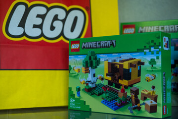 Fototapeta premium Bangkok, Thailand - January 19, 2024 : A box of LEGO Minecraft The Bee Cottage number of 21241. Action-packed set featuring Minecraft iconic bees. Lego is a popular line of construction