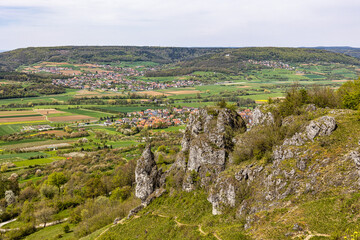 Fototapeta na wymiar Ehrenbuergstein and the walberla rock near village Kirchehrenbach, county Forchheim, upper franconia, bavaria, germany