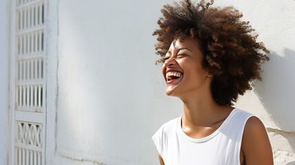 Radiant Joy - Close-up of a Black Woman Against White Wall - obrazy, fototapety, plakaty