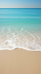 Fototapeta na wymiar A sandy beach with waves and a blue ocean. Generative AI.