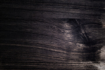 黒色に塗られた木材の木目