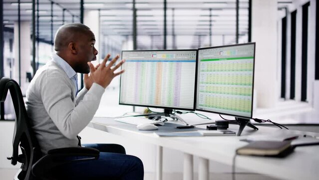 Data Analyst African Man Using Spreadsheet