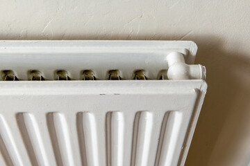 Close up of a  central heating radiator. - obrazy, fototapety, plakaty