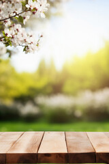 Naklejka na ściany i meble Wooden table spring nature bokeh background, empty wood desk product display mockup with green park sunny blurry abstract garden backdrop landscape ads showcase presentation. Mock up, copy space.