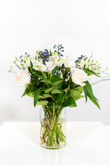 Elegant White Rose Bouquet Adorns a Beautiful Vase