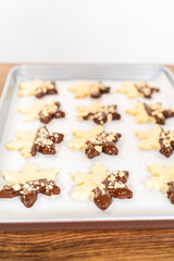 Making Cutout Sugar Cookies, Chocolate-Dipped, Hazelnut-Sprinkled