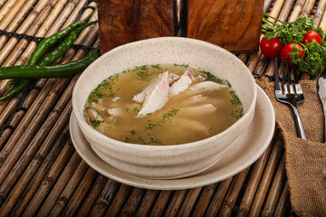 Tasty dietary chicken soup with vegetables