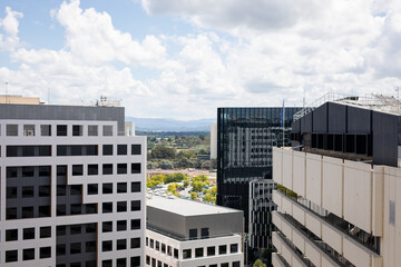 commercial real estate office buildings work towers sky clouds city view canberra act
