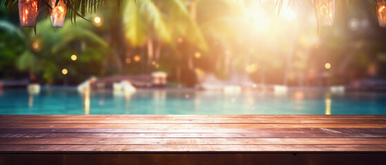 Wooden table pool bokeh background, empty wood desk product display mockup with blurry tropical hotel resort abstract poolside summer travel backdrop advertising presentation. Mock up, copy space.