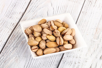 Salted tasty pistachio nuts heap