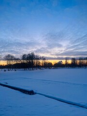 Winter park in the evening time, snow in the park, sunset park, winter landscape