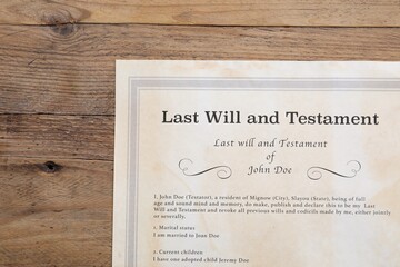 Last Will and Testament on wooden table, top view