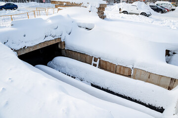 Repair work in winter: sweat with a thick layer of snow, city heat supply networks, underground...
