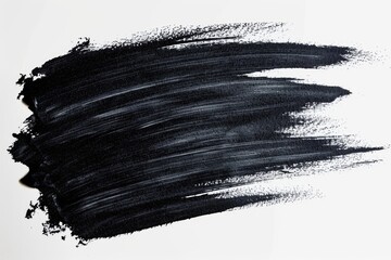 A close-up view of a black brush stroke on a white background. Suitable for graphic design and...