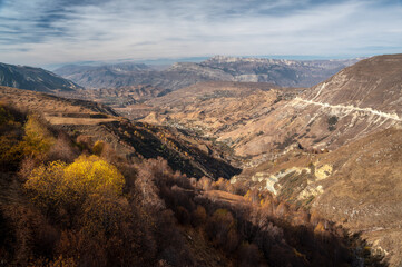 Panorama of the aul Matlas and the Caucasus mountain range. Dagestan, october 2020.