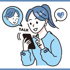 Fototapeta premium スマホで旦那さんとやりとりをする女性