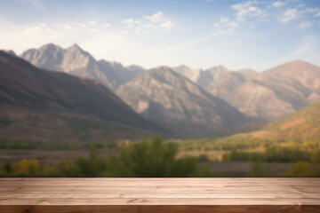 Wooden table mountains bokeh background, empty wood desk surface product display mockup with blurry nature hills landscape abstract travel backdrop advertising presentation. Mock up, copy space.