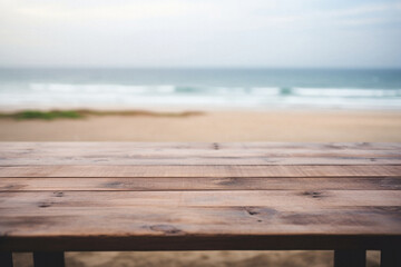 Wooden table ocean bokeh background, empty wood desk surface product display mockup with blurry sea...